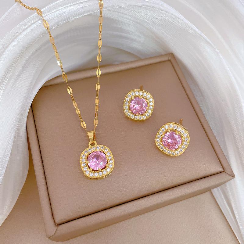 Set di collana, orecchini e anello in acciaio al titanio con design geometrico di lusso