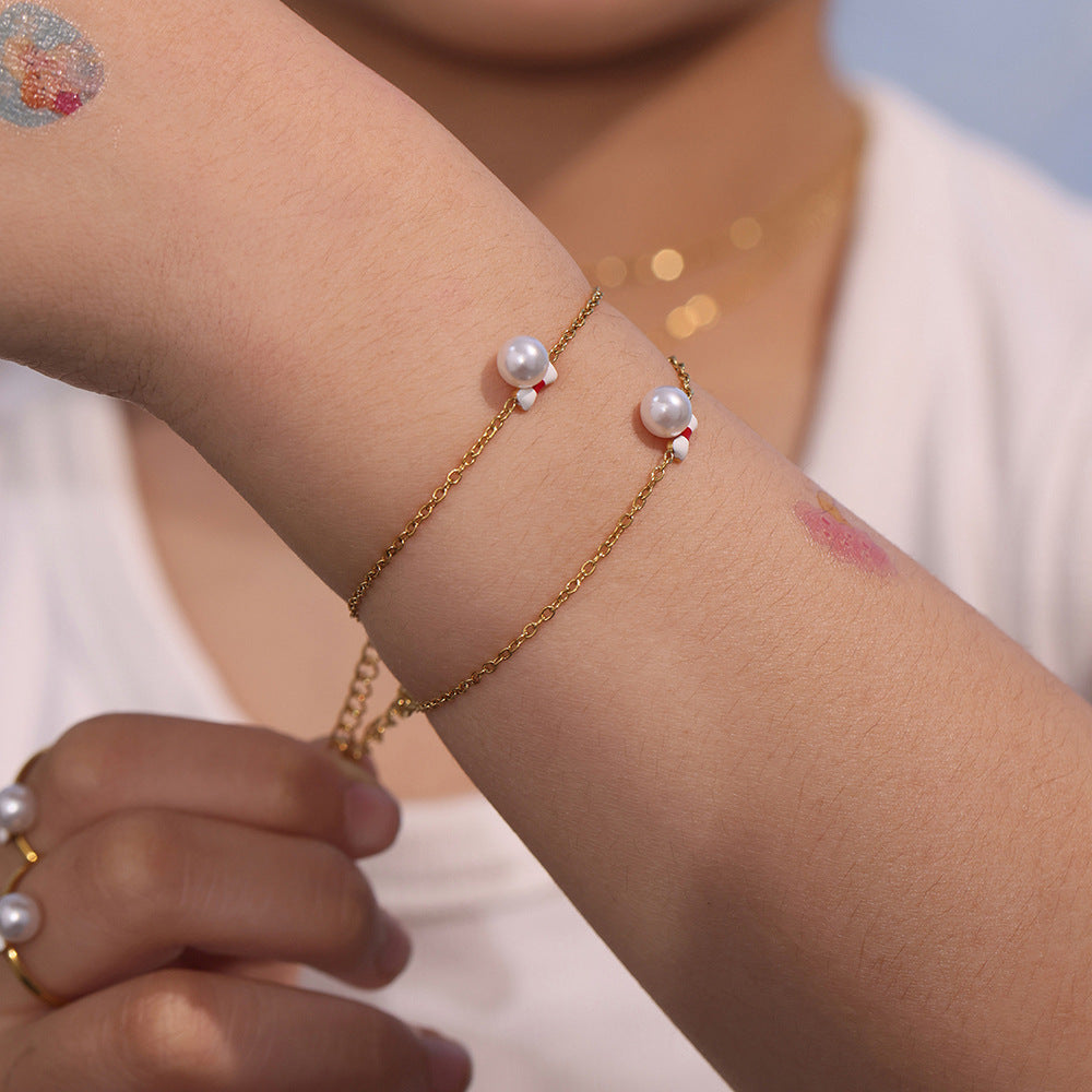 Elegante Conjunto de Collar, Pulsera, Anillo y Pendientes de Acero Inoxidable Brillante con Lazo para Mujer, con Colgante de Acero de Titanio y Acabado Chapado