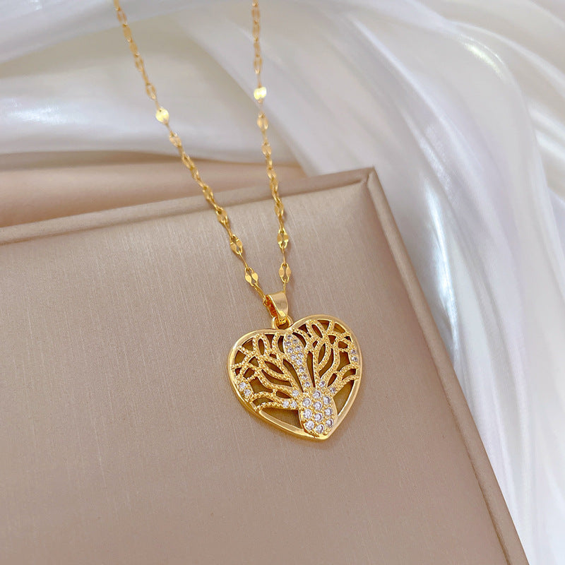 Collana con pendente a cuore cavo minimalista per uomo e donna, catena a serpente in acciaio inossidabile con strass