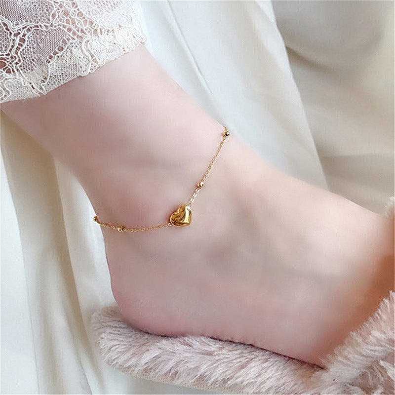 Cavigliera Minimalista a Cuore in Acciaio al Titanio Placcato Oro 18K da Donna