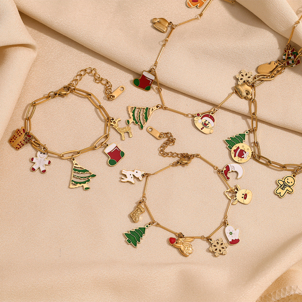 Collana con ciondolo a cartone animato natalizio carino da donna, in acciaio inossidabile con placcatura in oro 18 carati, catena a serpente con motivi a fiocco di neve, renna e campanella di Babbo Natale