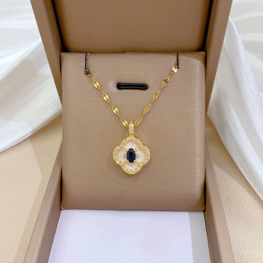 Collana con ciondolo a luna geometrica minimalista per donna e uomo, catena in acciaio inossidabile con elegante motivo a conchiglia e quadrifoglio