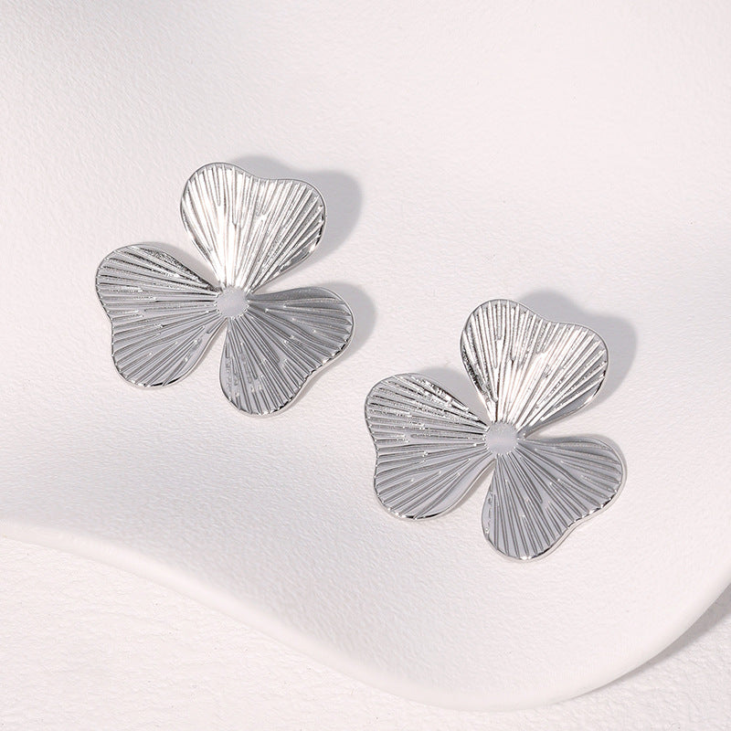 Orecchini a perno floreali minimalisti in acciaio inossidabile da donna con placcatura in oro, design unico e sobrio