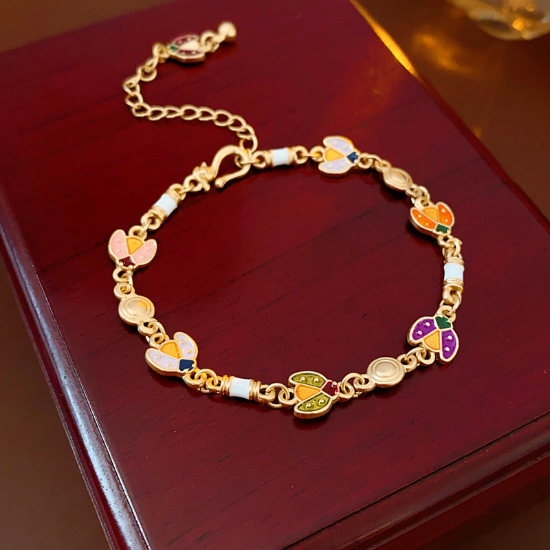 Bracciale vintage da donna con motivo floreale geometrico in lega e smalto, elegante gioiello di lusso