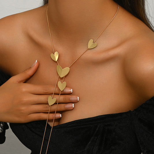 Collar con colgante de corazón geométrico de lujo para mujer, cadena de clavícula chapada en aleación de zinc