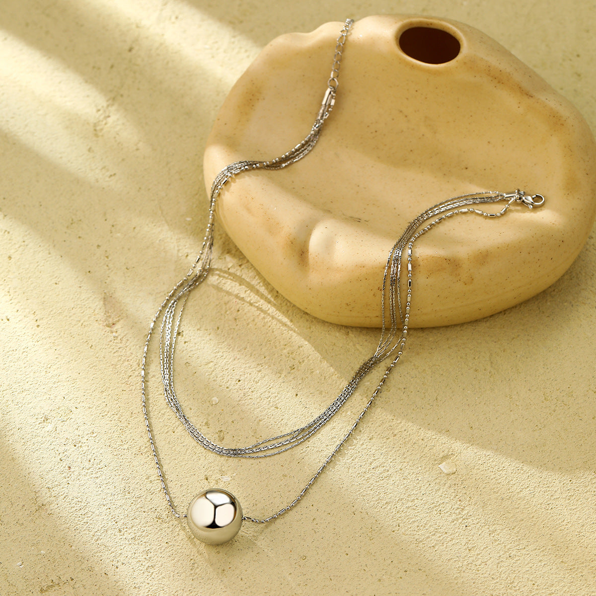 Collana con ciondolo geometrico minimalista in acciaio inossidabile con finitura placcata da donna