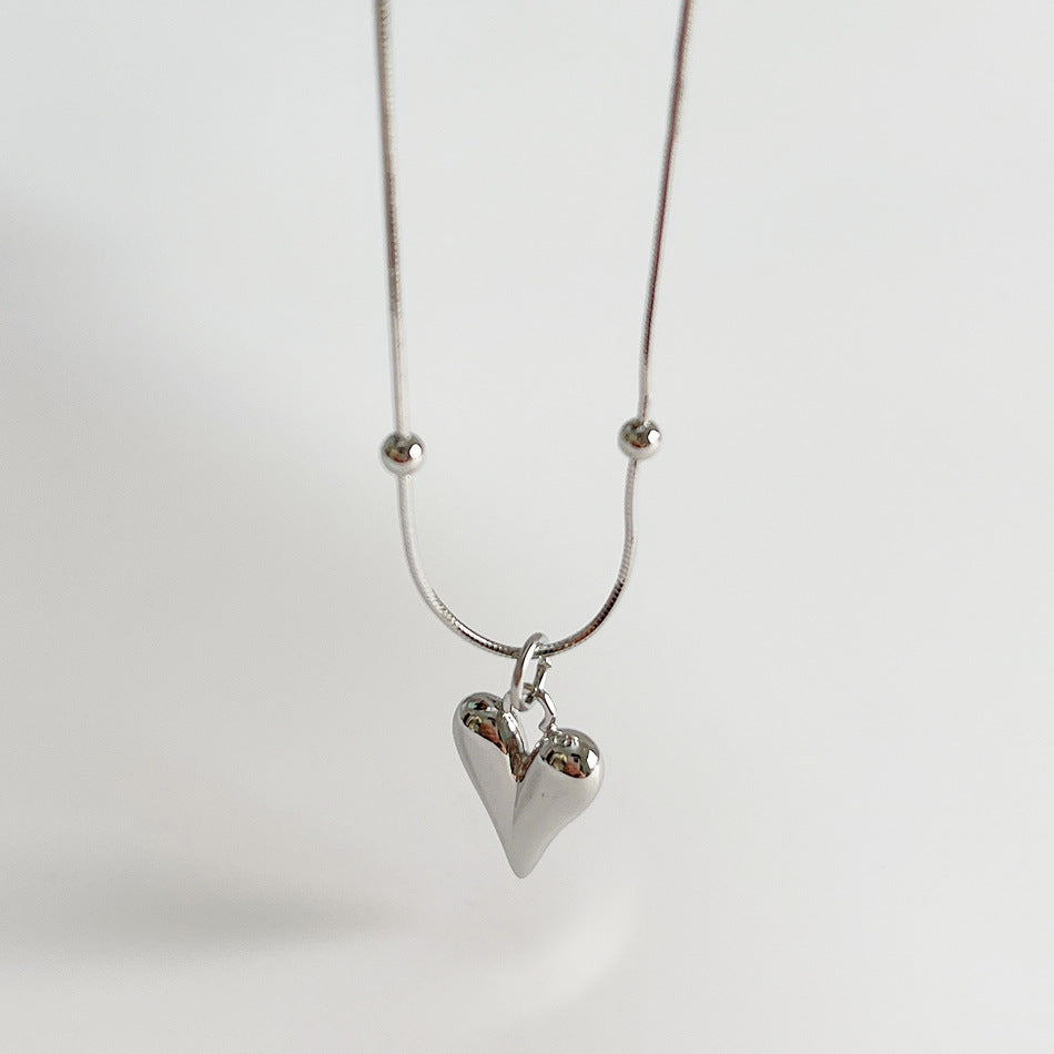Collana da donna minimalista con ciondolo geometrico a cuore tondo in argento sterling 925