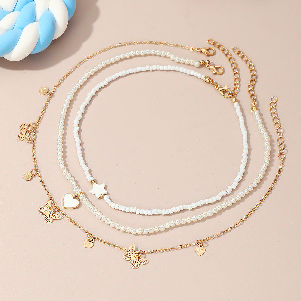 Set di collane con ciondoli a forma di cuore, farfalla e stella, da bambina, con ciondolo in lega e catena di perle in stile principessa