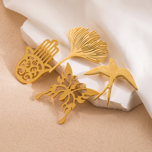 Spilla da Mano Minimalista Dolce-Audace in Acciaio Inossidabile con Farfalla Cava e Foglia di Ginkgo Unisex