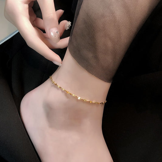 Tobillera minimalista para mujer con forma de labio, de acero de titanio con patrón de cielo estrellado y textura ondulada