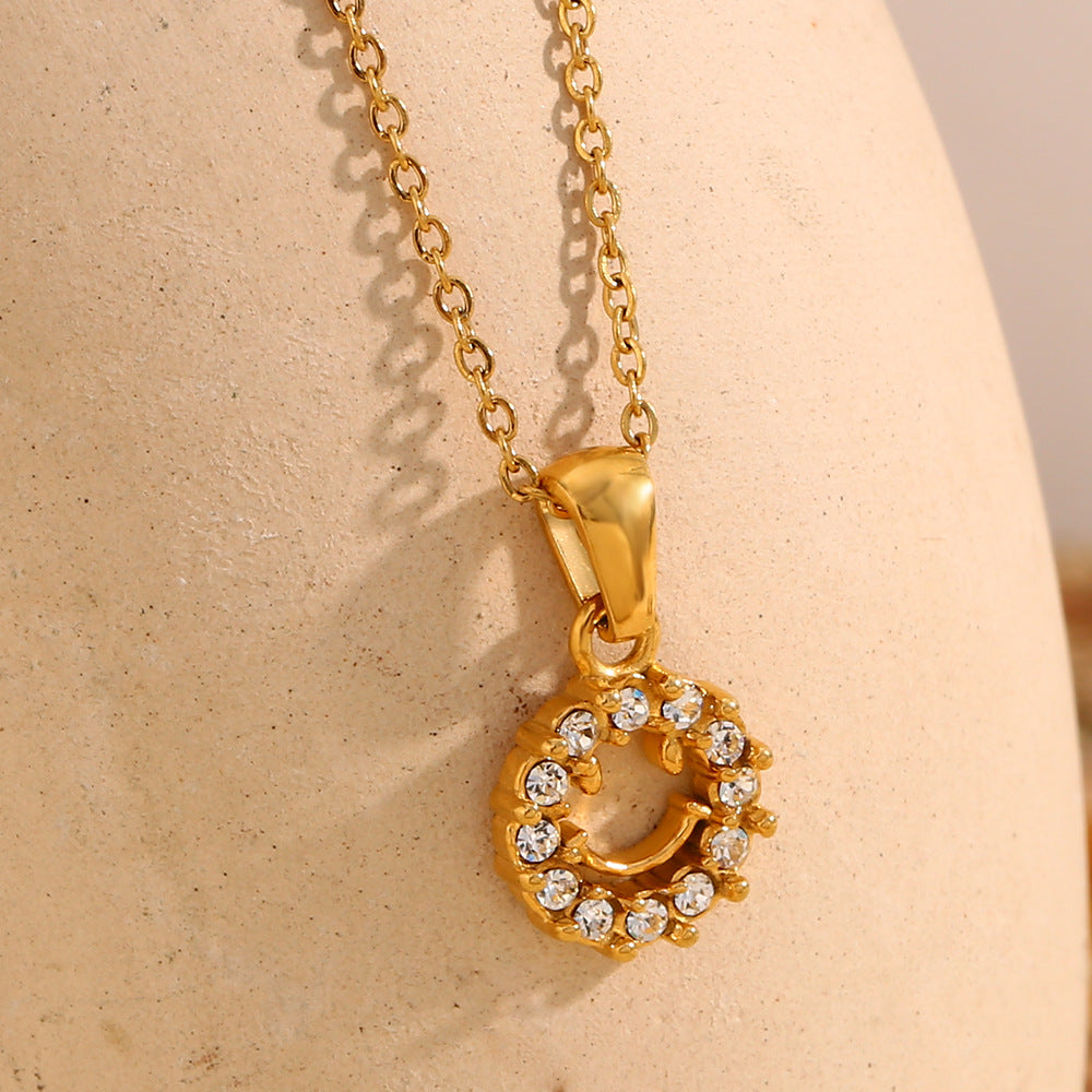 Minimalist Geometric Hollow Smiley Face Pendant Necklace for Women in Stainless Steel with 18K Gold Plating and Zircon Inlay