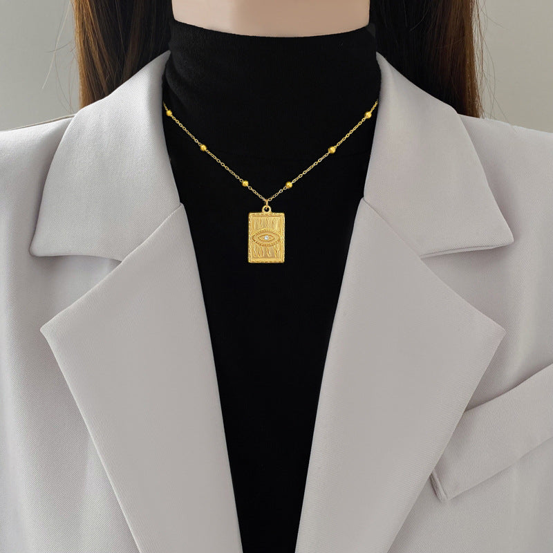 Minimalist Geometric Titanium Steel Pendant Necklace for Women and Men with Gold Plated Finish and Angular Bead Detail