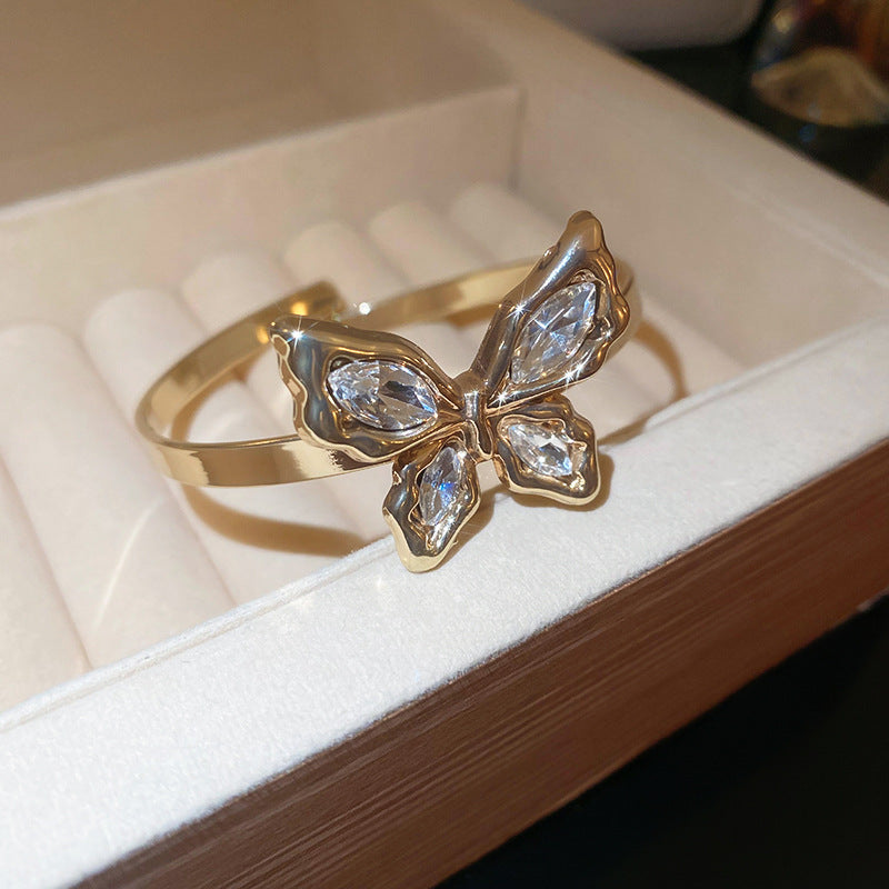 Pulsera tipo brazalete de aleación de cobre bañada en oro de lujo con incrustaciones de diamantes de imitación para mujer