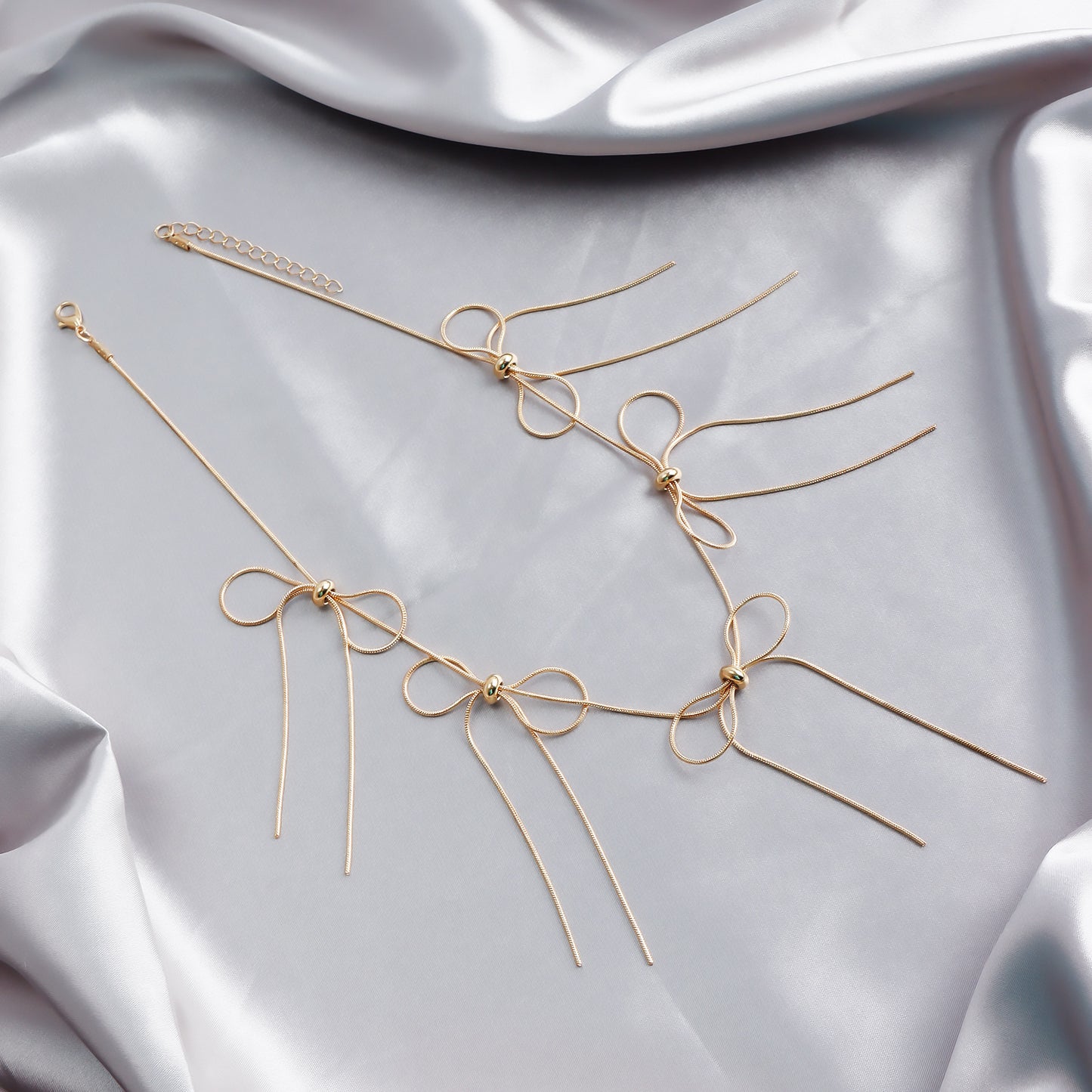 Fashionable Bowknot Tassel Pendant Necklace with Geometric Design on Polished Metal Snake Chain for Women