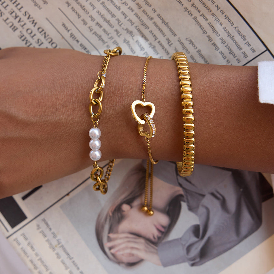Pulsera de lujo minimalista geométrica de corazón de acero inoxidable chapada en oro de 18 quilates para mujer
