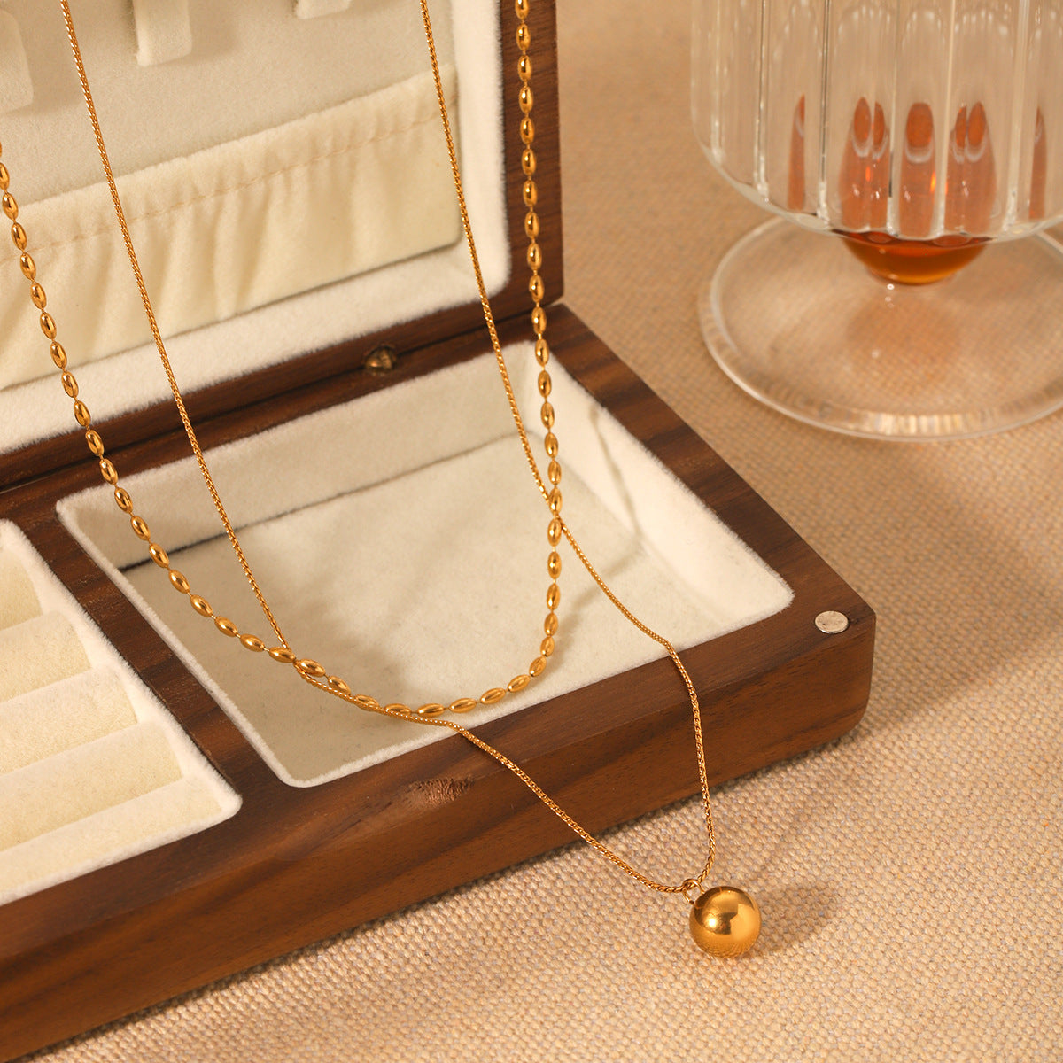 Minimalist Geometric Gold-Tone Stainless Steel Double-Layer Necklace with Small Spherical Pendant and Twisted Chain