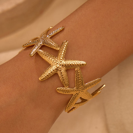 Pulsera de acero inoxidable con forma de estrella de mar de moda con acabado de baño para mujer, accesorio elegante de diseño geométrico