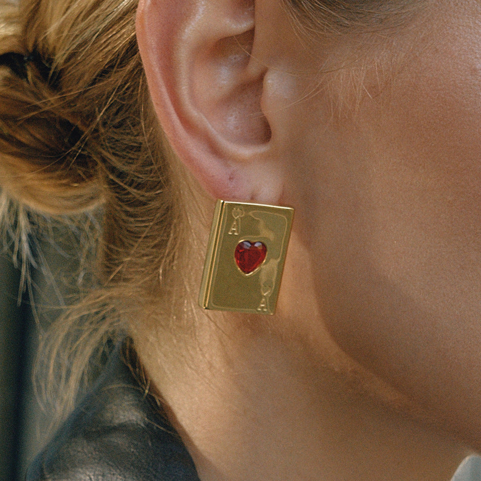 Juego de pendientes de botón y anillo de acero inoxidable en forma de corazón con incrustaciones de diamantes de imitación y acabado chapado para mujer