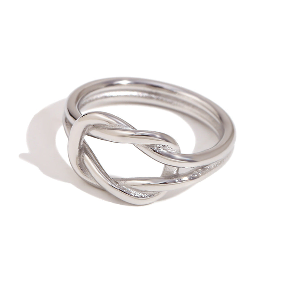Minimalist Geometric Stainless Steel Ring with 18K Gold Plating, Swirl Knot and Daisy Accent for Women