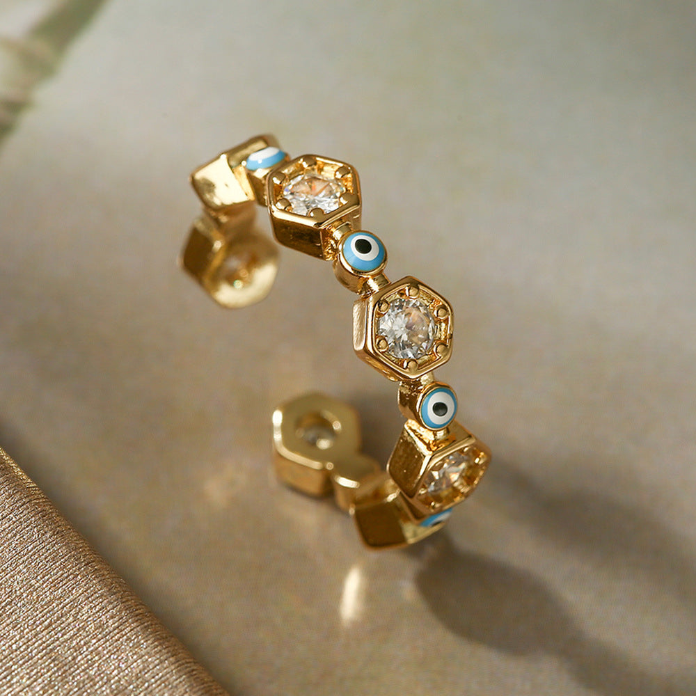 Anello da donna geometrico a forma di occhio, aperto, in rame placcato oro vero con intarsio in zirconi