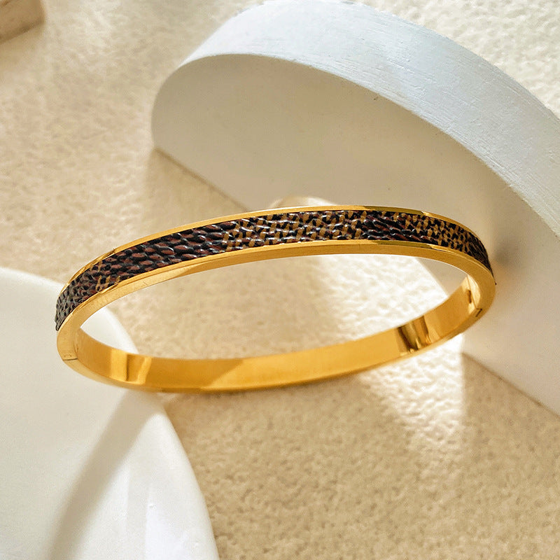 Minimalist Titanium Steel Plated Bracelet with Black Leather Texture