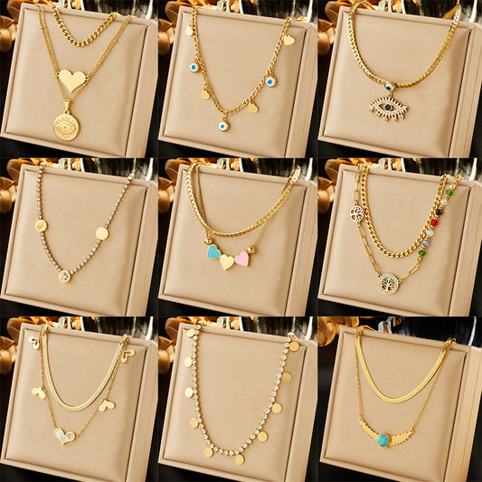 Collana con ciondolo a cuore in acciaio inossidabile, stile minimalista, con strass intarsiati e catena di perline colorate
