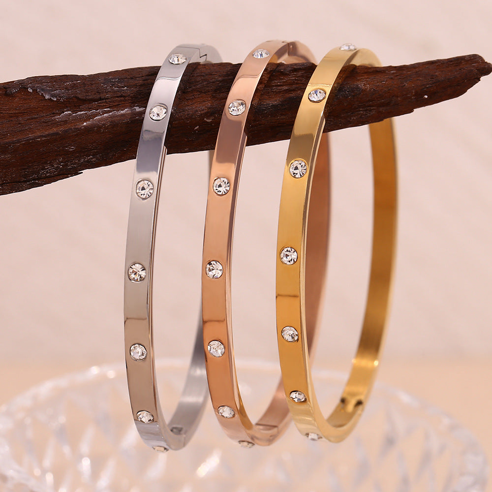 Bracciale Minimalista Geometrico in Acciaio Inossidabile con Placcatura in Oro 18K Finitura Oro Rosa e Accenti in Zirconia Rotonda