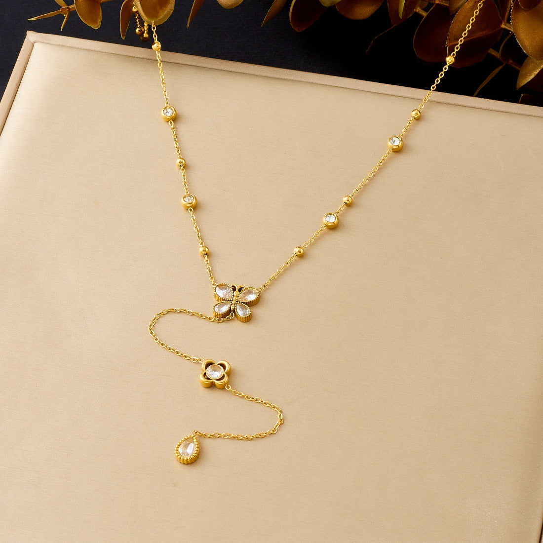 Elegant Gold Plated Stainless Steel Y-Chain Necklace with Rhinestone Floral and Star Charms