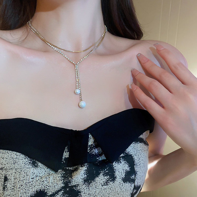 Collana con pendente a cuore a goccia in stile lusso con intarsio in strass in acciaio al titanio su catena in rame da donna