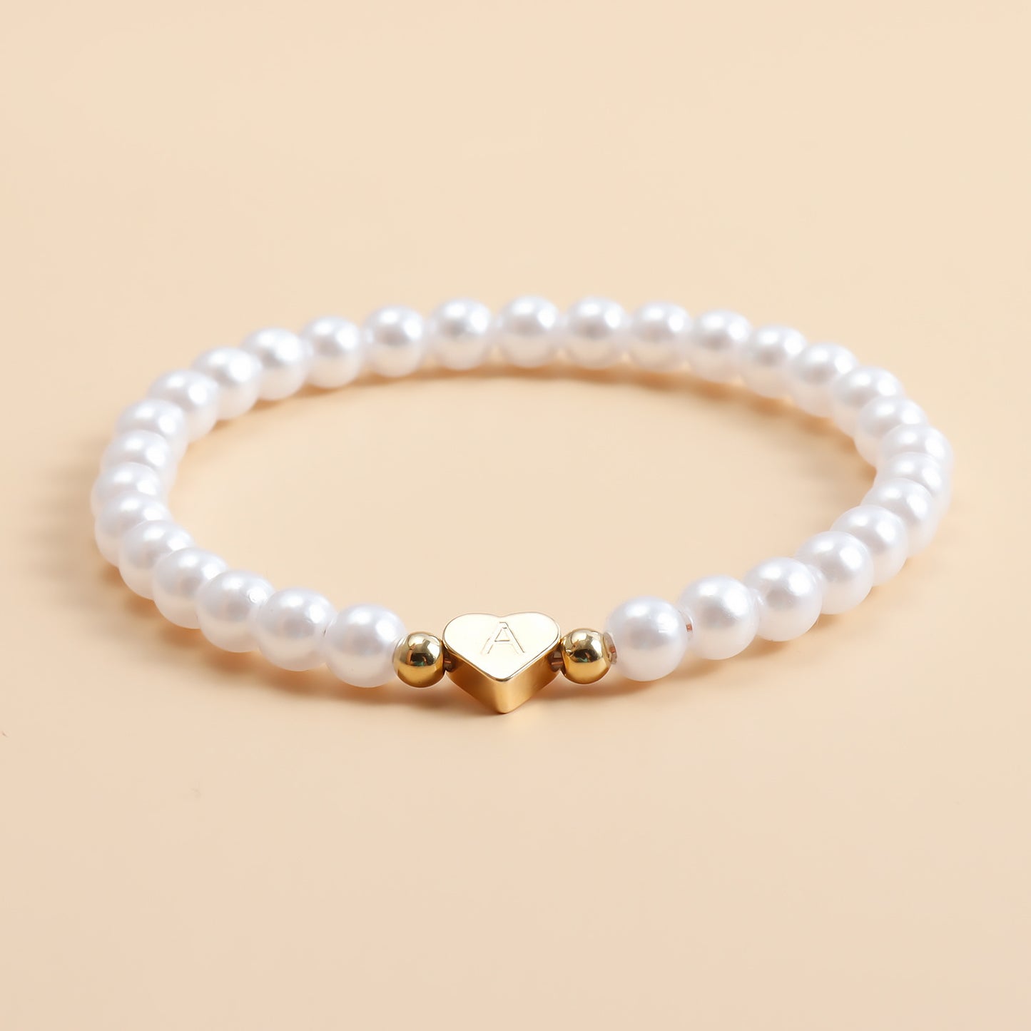 Minimalist Geometric Heart-Shaped Alloy Bracelet with Gold Plating and Simulated Pearl Accents