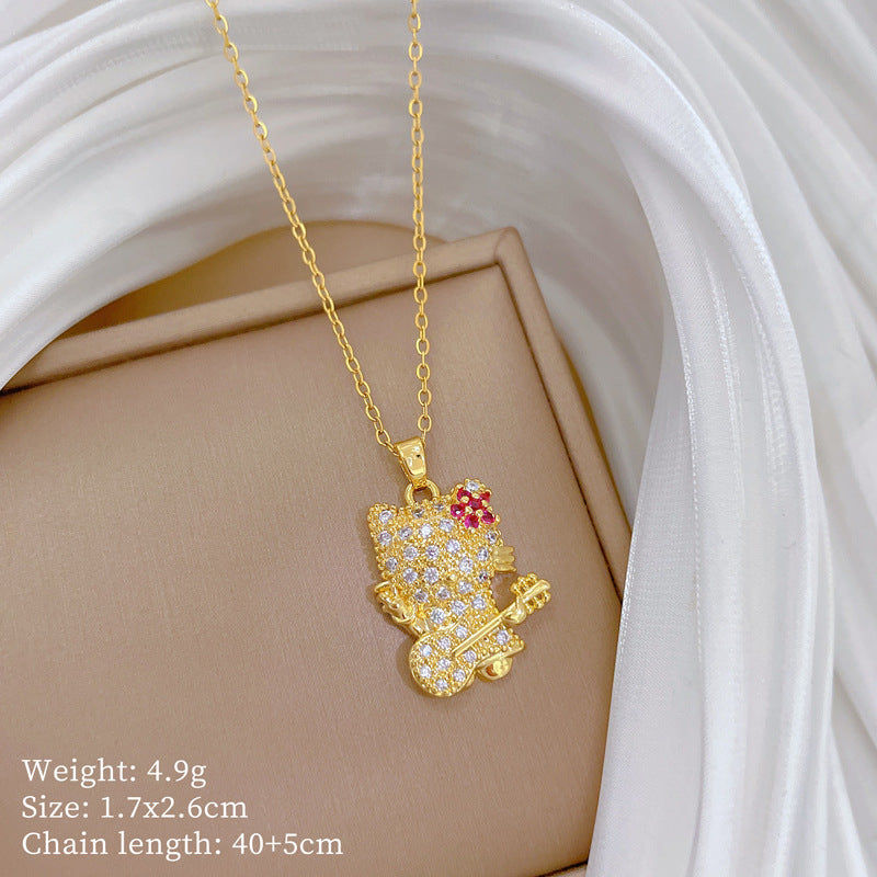 Collana con ciondolo gatto chitarra stile fumetto per donna con intarsio di strass su catena in acciaio al titanio