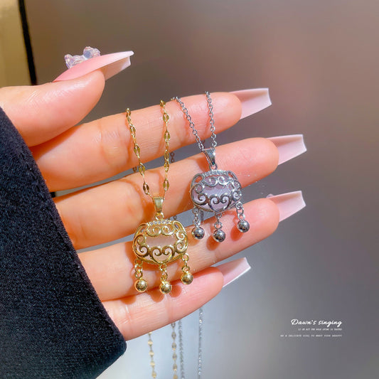 Titanium Steel Longevity Lock Pendant Necklace with Simulated Hetian Jade Inlay and Tassel Detail for Women