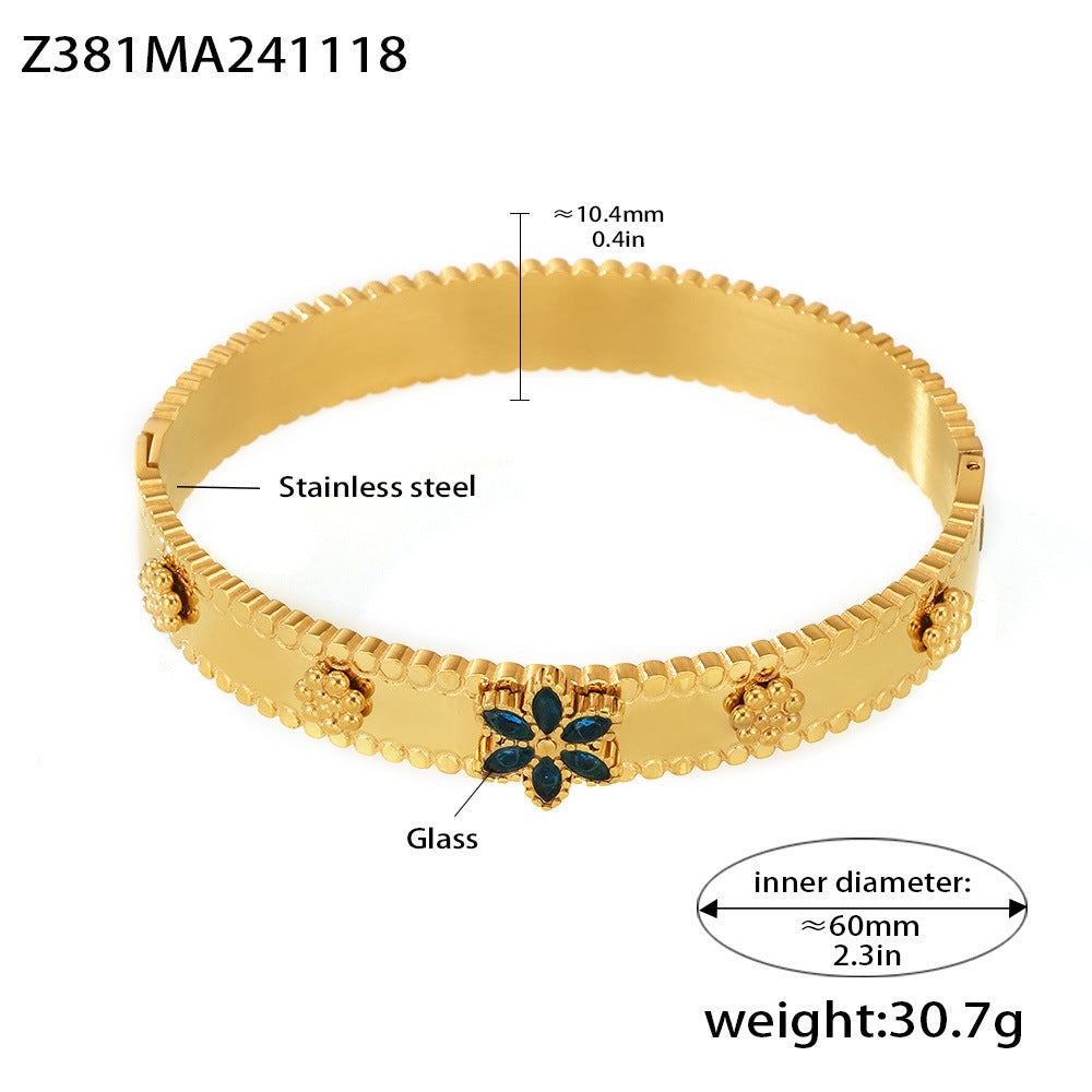 Pulsera de acero inoxidable con forma de copo de nieve y rueda de la fortuna, con incrustaciones de circonita y chapado en oro de 18 quilates.