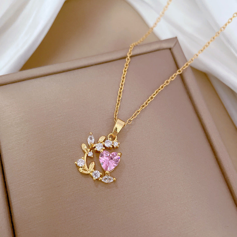 Collana con catena a collare elegante di lusso in acciaio al titanio con zircone a foglia di cuore per unisex