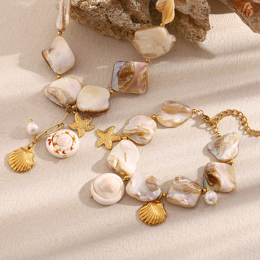 Set collana e bracciale pendente conchiglia barocca in acciaio inossidabile placcato oro 18K da donna con motivi di stelle marine e vita marina