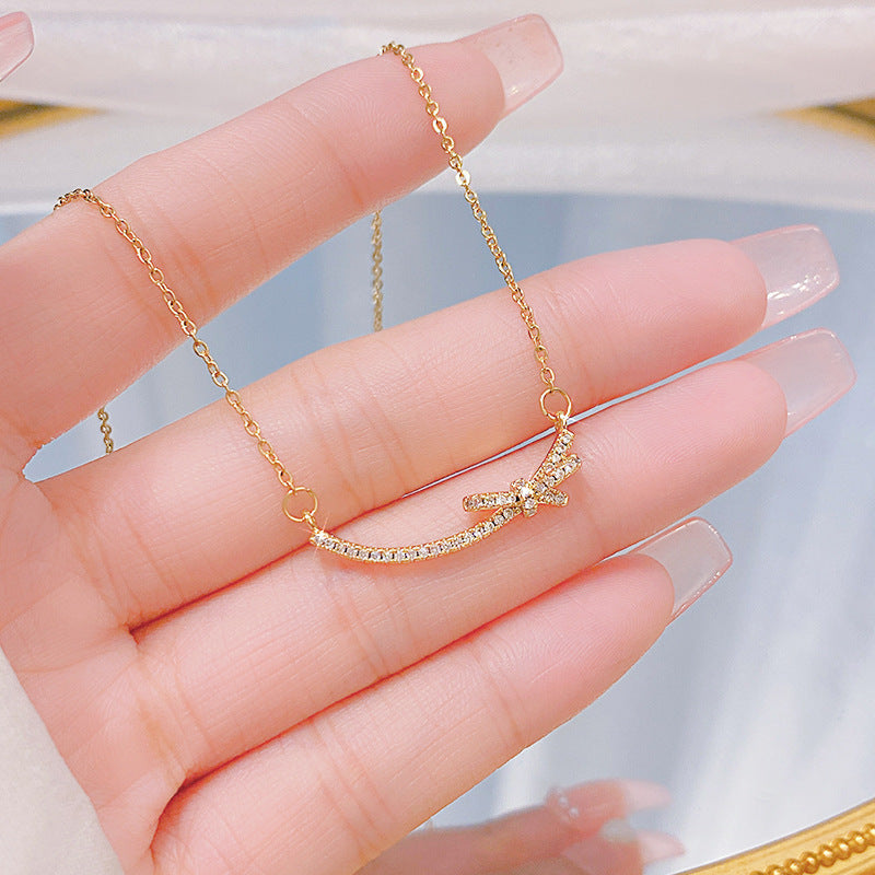 Minimalist Bow-Shaped Titanium Steel Necklace for Women with Alloy Pendant and Cross Chain Design