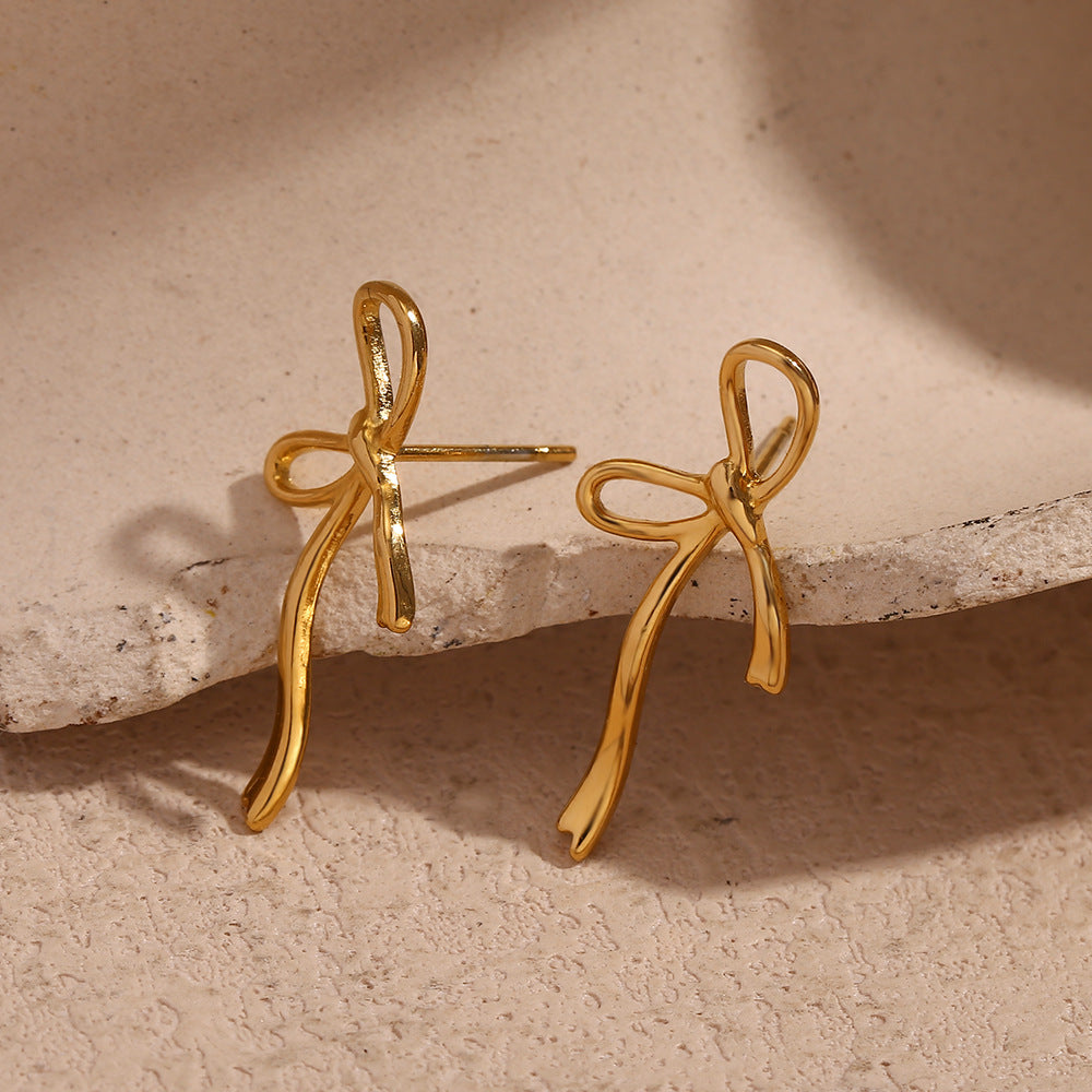 Pendientes minimalistas creativos de acero inoxidable con forma de lazo y baño de oro de 18 quilates para mujer
