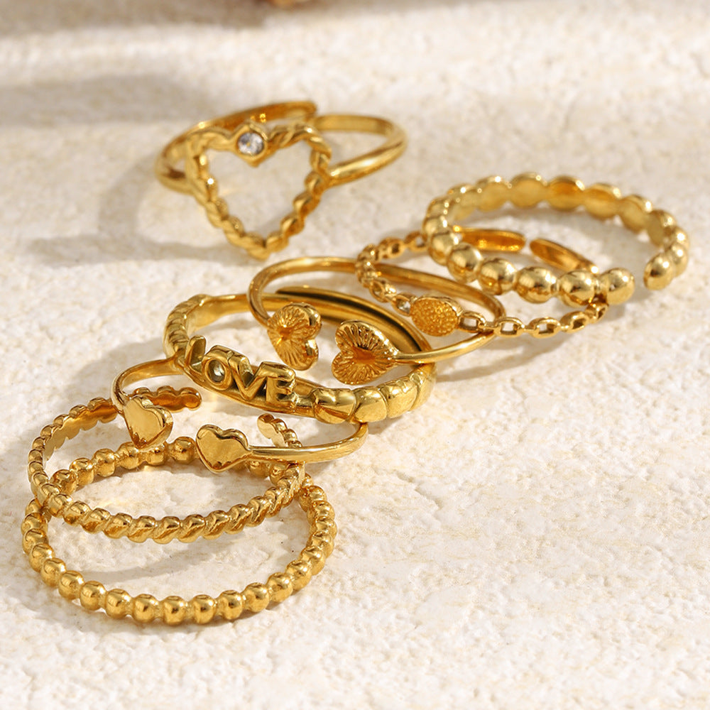 Anillo abierto minimalista de acero inoxidable chapado en oro de 18 quilates con corazón de circonita