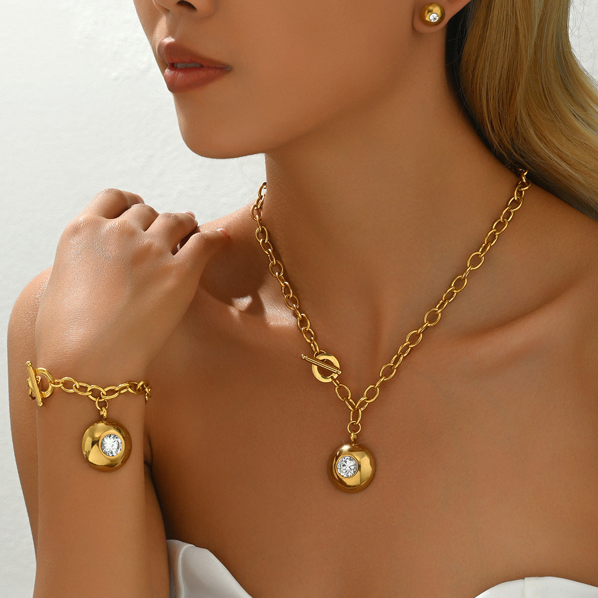 Set di collana e bracciale a forma di cuore in rame alla moda con intarsio in zircone per donna