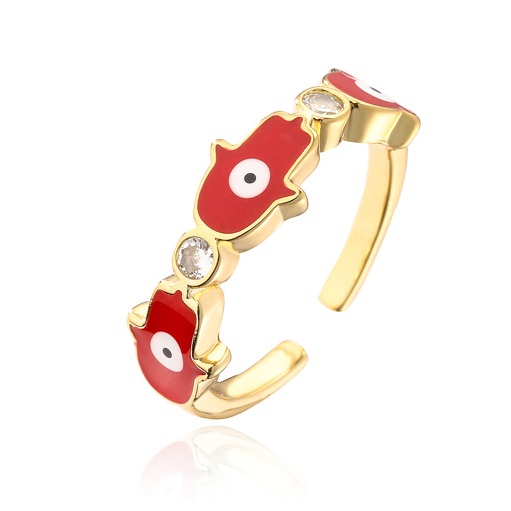 Anello da donna in rame con placca in oro 18K, finitura smaltata e intarsio in zircone, design Mano di Fatima
