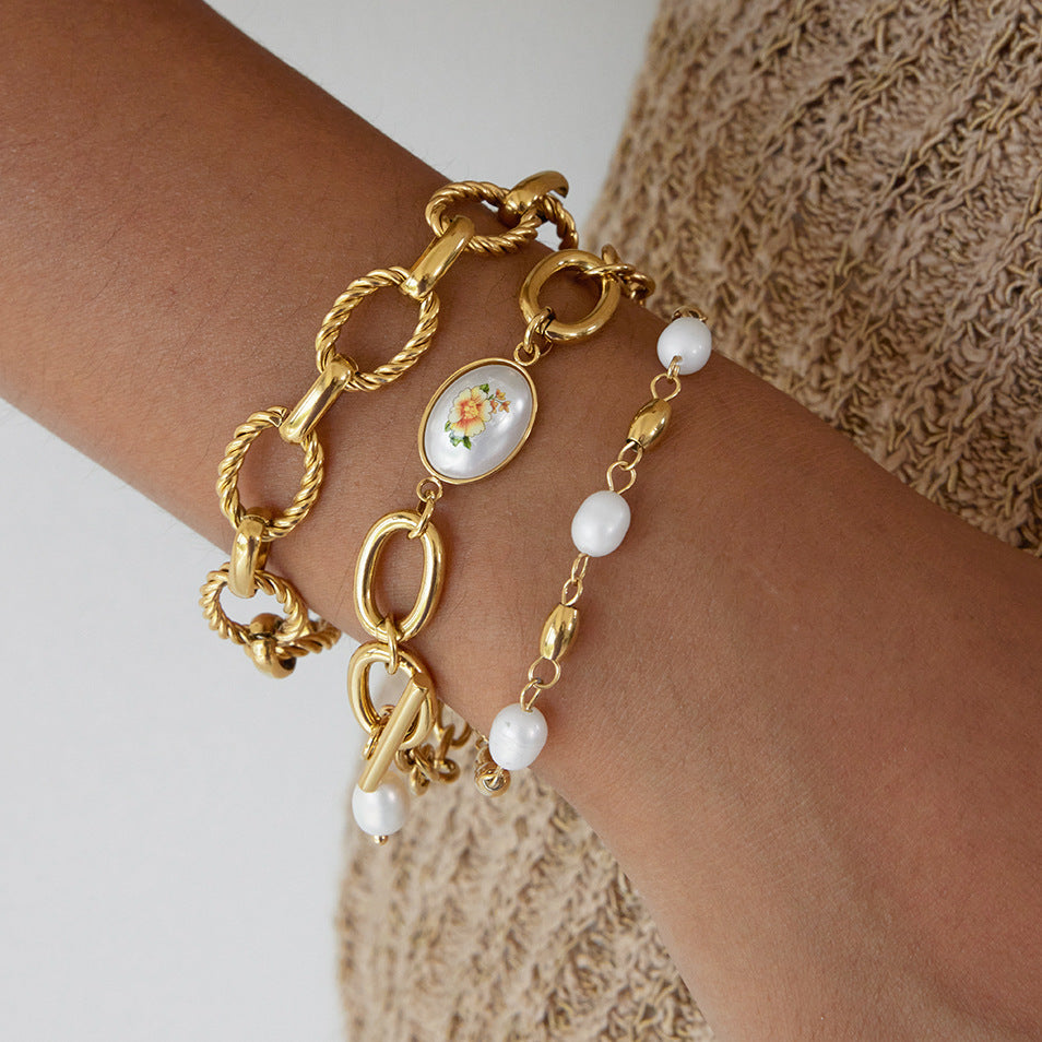Elegante bracciale geometrico in acciaio inossidabile con perle d'acqua dolce e placcatura in oro da donna