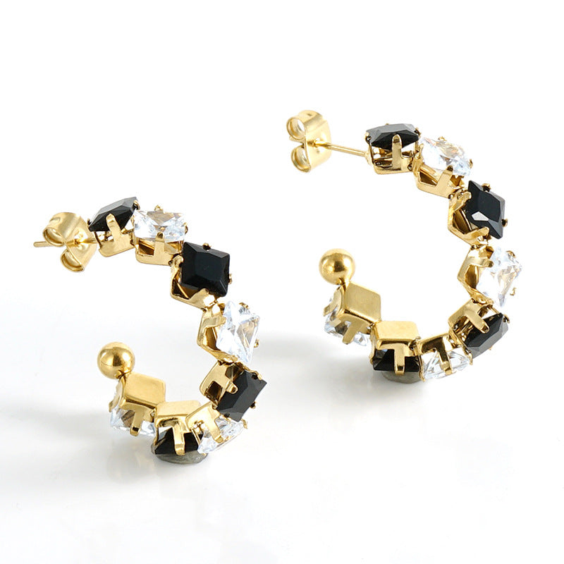 Orecchini a perno da donna alla moda geometrici in acciaio al titanio placcato oro 18K con zirconi