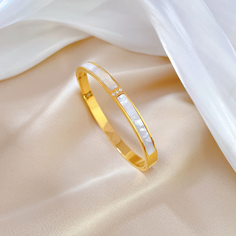 Bracciale Minimalista Etnico Vintage con Conchiglie in Acciaio al Titanio