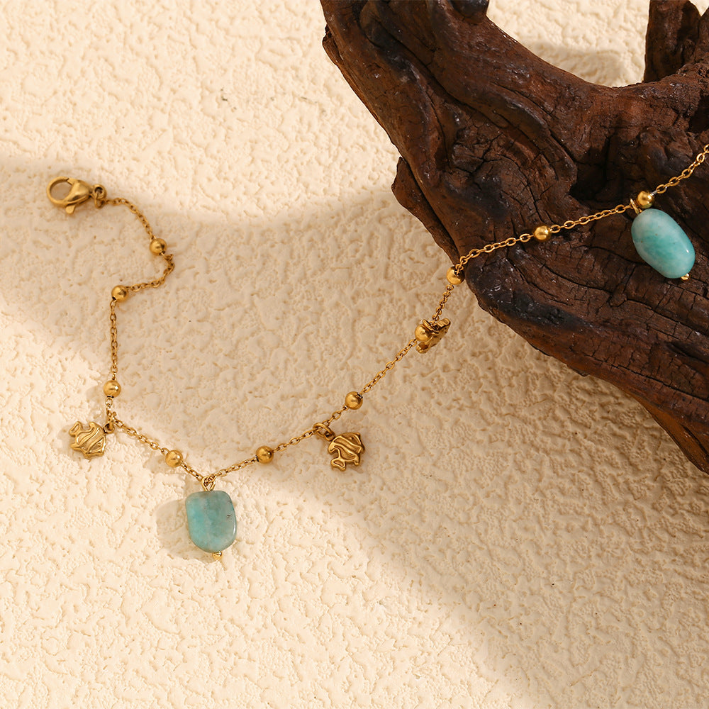 Cavigliera minimalista a forma di pesce in acciaio inossidabile con placcatura in oro 18 carati e ciondolo acquamarina da donna