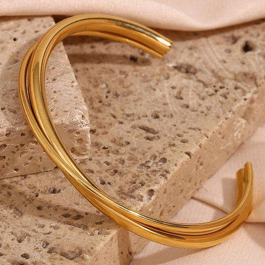Pulsera de moda minimalista para mujer, de acero inoxidable, brazalete doble cruzado, con baño de oro de 18K