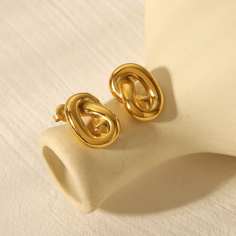 Geometric Line-Twist Titanium Steel Stud Earrings for Women with 18K Gold Plating and Modern Design