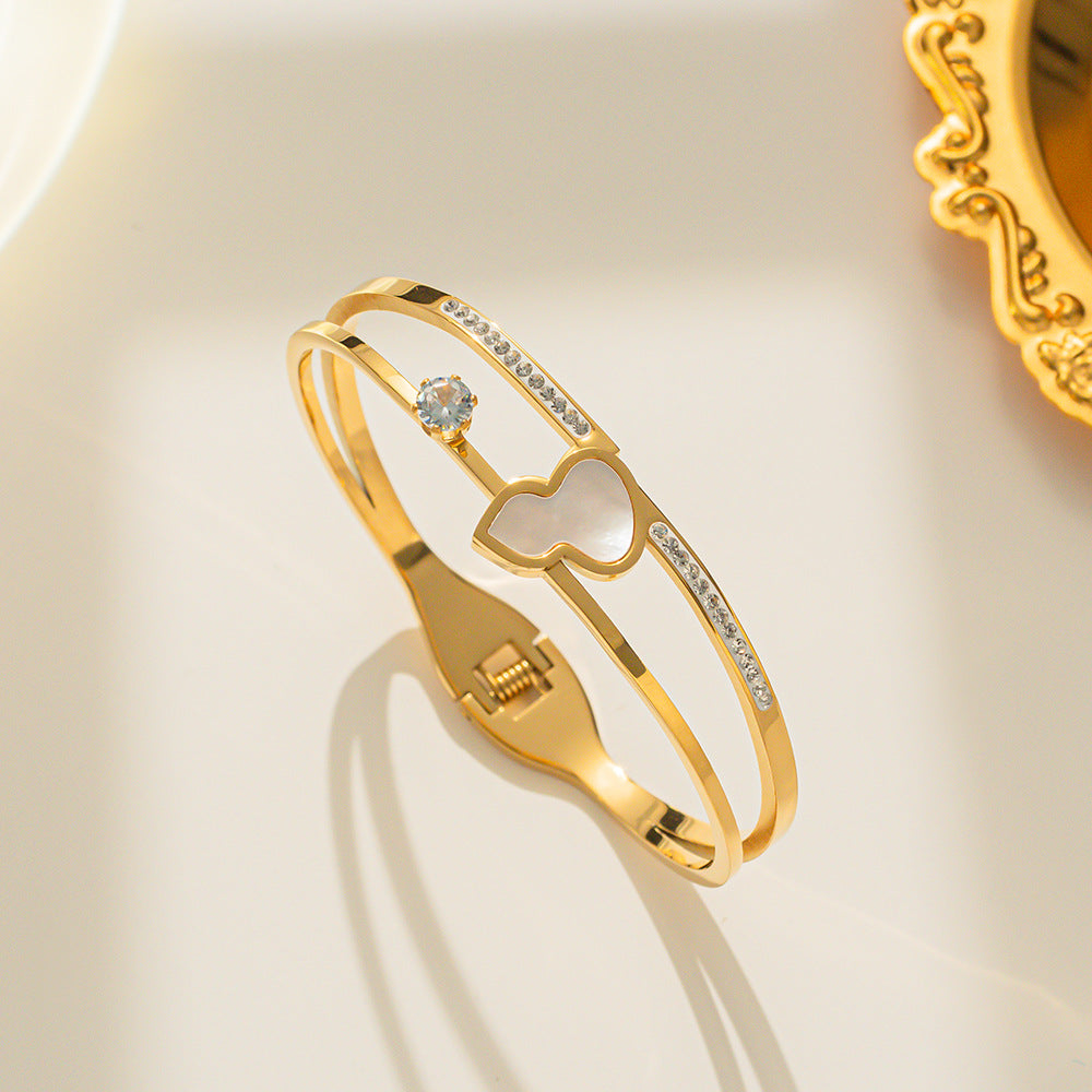 Bracciale minimalista "Zucca fortunata" da donna in acciaio al titanio placcato oro 18K con intarsio in madreperla