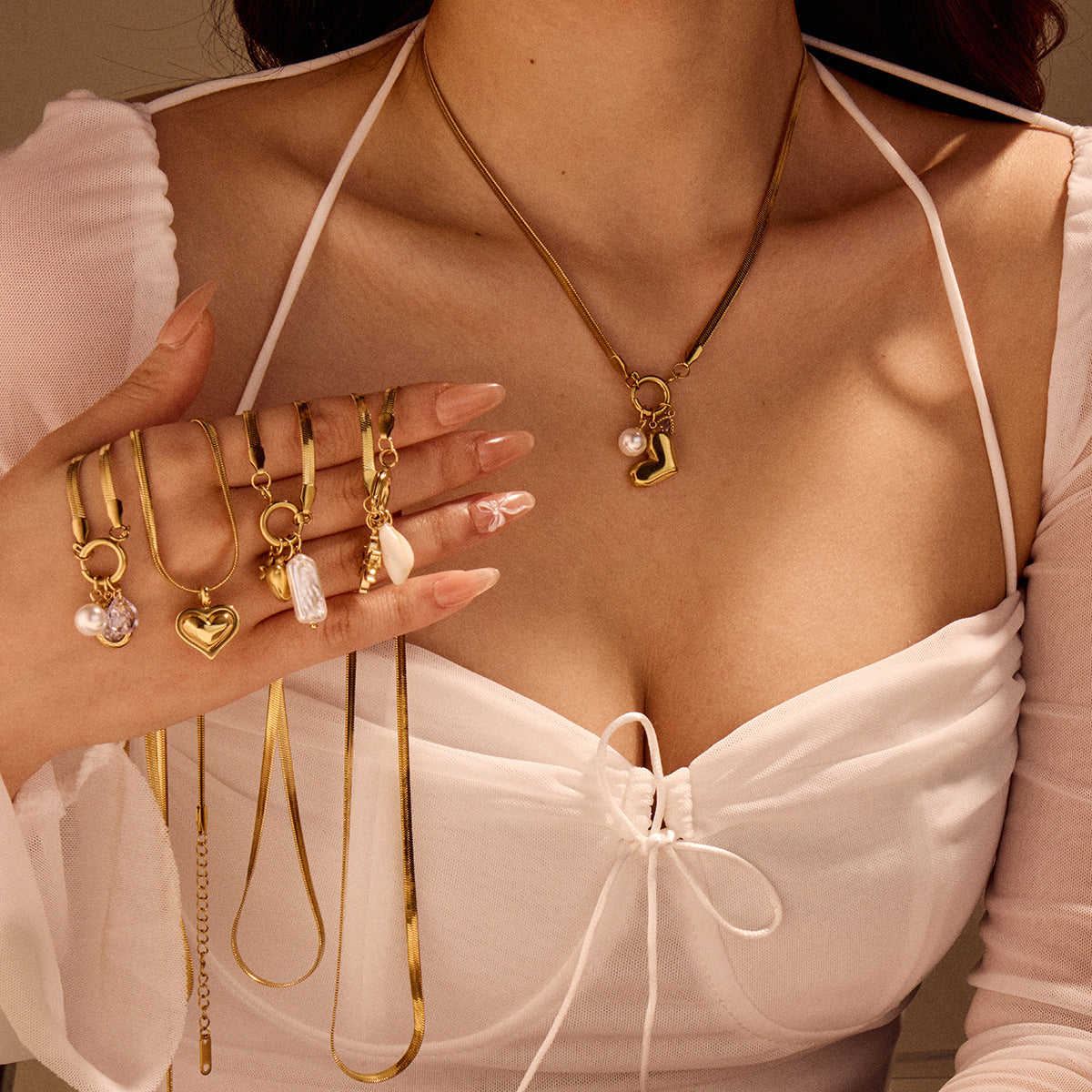Collana da donna alla moda con ciondolo a cuore in acciaio inossidabile placcato