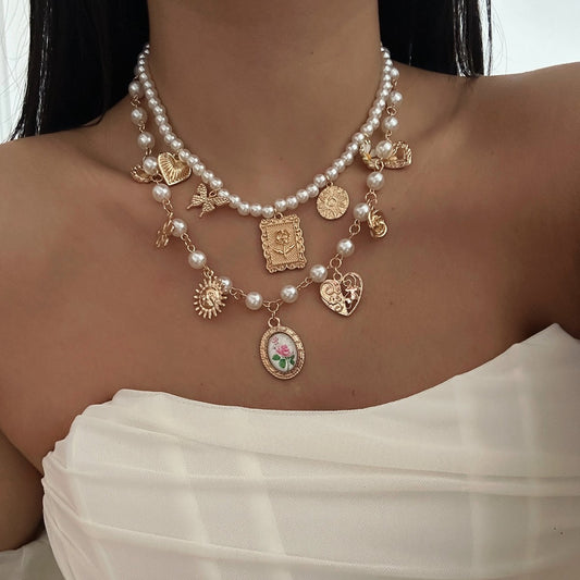 Collar con colgante en forma de corazón floral bohemio chapado en aleación con borla de perlas de imitación para mujer