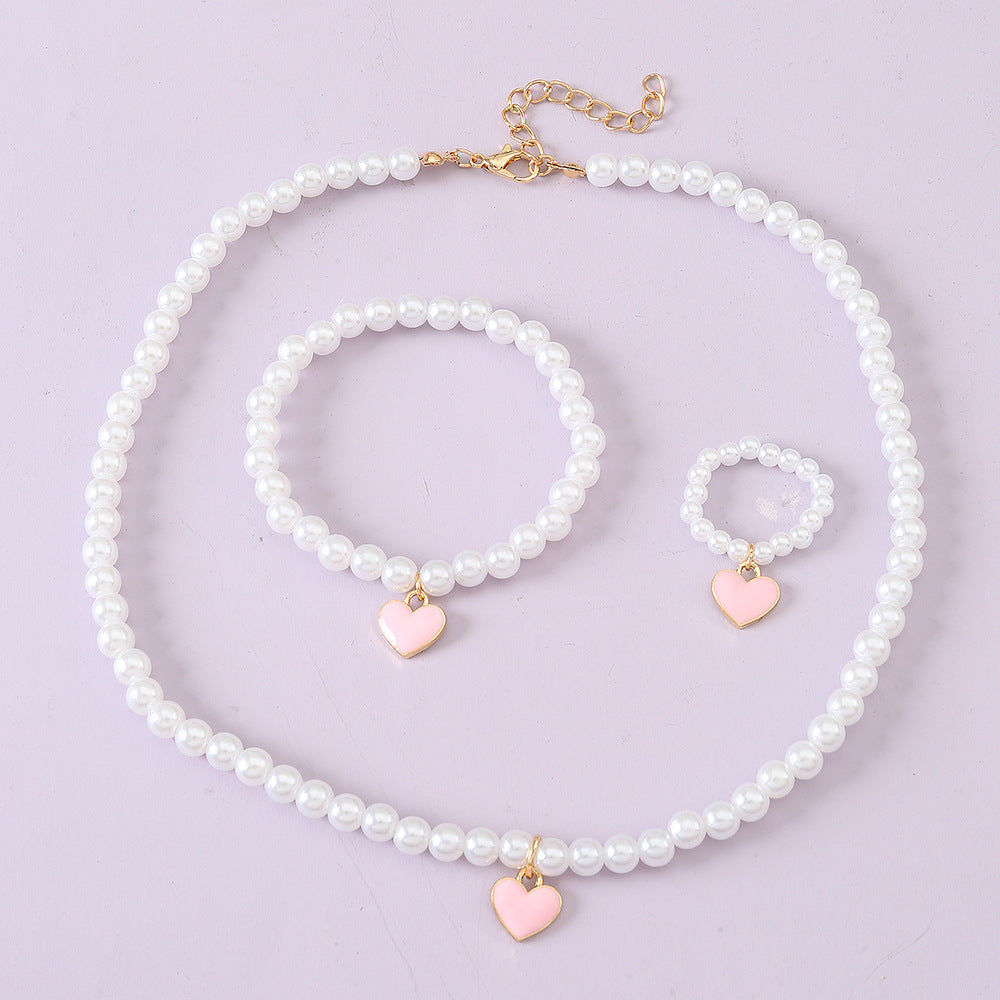 Juego de collar con colgante de aleación con forma de corazón para niñas, con cadena de perlas de agua dulce, para mayores de 6 años.